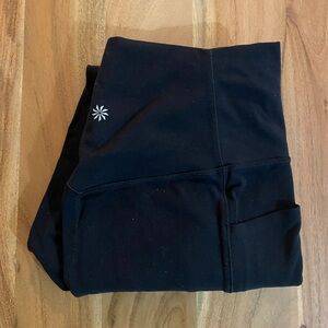 Black Athleta Salutation Stash Pocket II 7/8 Leggings